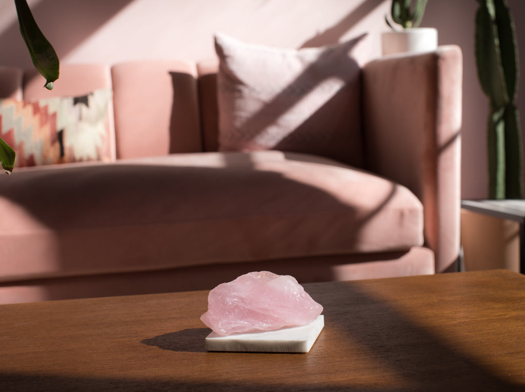 Raw Rose Quartz on table